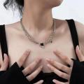 Korean version fashion purple black gemstone pendant necklace female ins niche design personality light luxury style collarbone chain. 