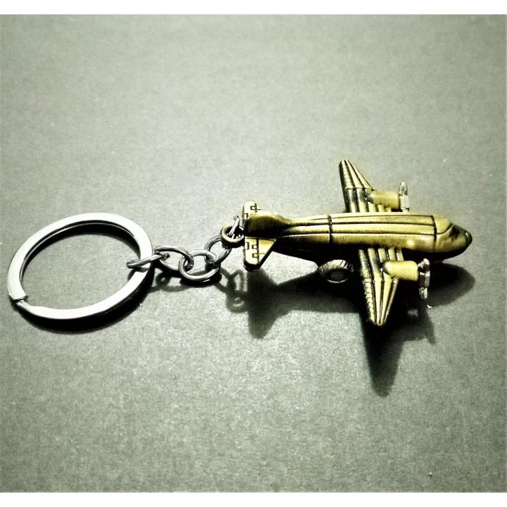 Heavy weight metallic Aeroplane Keychain with rotating wheels | Daraz.pk