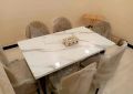 dinig table with 4 chairs, marble textured top, sheesham wooden frame with 4 full cussion chairs. 