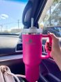 Stanley Quencher H2.0 FlowState™ 40oz Fuchsia Pink Sustainable Hydration Tumbler - Ultimate Temperature Control Coffee Mug for Eco-Conscious Adventurers. 