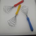 egg mixer- stainless steel egg mixer with plastic handle. 