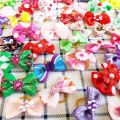 20 pieces Cute Ribbon Pet Hair Bows Elastic Rubber Band Dog Hair Accessories Cat Hair Flower Pet Photo Props Christmas Gift. 
