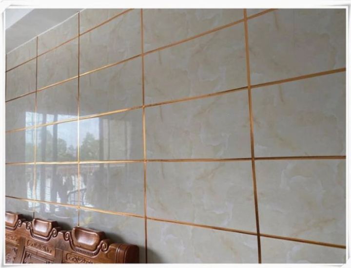 Tile%20Gap%20Filler%20Tape%20in%20Gold:%20Easy%20Peel-and-Stick%20Solution%20for%20Perfect%20Finishes%20Home%20Decor%20%E2%80%93%20Peel%20and%20Stick%20Design%20for%20Easy%20Wall%20Transformations%20,%20Home%20decor%20gold%20strip%20-%20Image%203