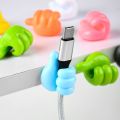 [PACK OF 10] Cute Hand Thumb wire holder silicon thumbs up wire holder | 10 Thumb Hook Creative Cute Data Cable Wire Storage Fixed Cable Organizer No Trace Sticky Hook Multifunctional Clip Holder | 10Pcs (random color) -Orchid Store PK. 