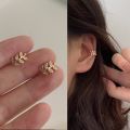 Enacolor Gold Color Leaves Ear Cuff Black Non-Piercing Ear Clip Earrings for Women Men  Cartilage Earring Cuff Jewelry Wholesale. 
