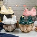 Large Stainless Steel Mesh Wire Egg Storage Basket with Ceramic Farm Chicken Top and Handles. 