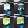 Mini Portable Bluetooth & Rechargeable Speaker with Light + SD Card + USB Supported Multi Color. 