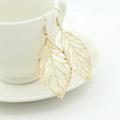 2021 Hot Fashion Wholesale Jewelry Hollow Metal Leaves Dangling Long Statement Drop Earrings For Women Gift Anniversary. 