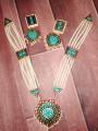 Kundon set in meena work. 