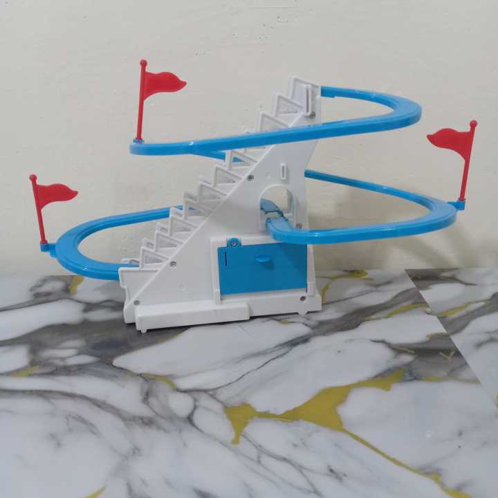 Electric%20Duck%20Climbing%20Stairs%20Toy%20with%20Track%20%7C%20Musical%20Roller%20Coaster%20Duck%20Race%20with%20LED%20Lights%20&%20Music%20%7C%20Battery%20Operated%20Duck%20Slide%20Toy%20for%20Kids%20Boys%20&%20Girls%20%7C%20Fun%20Duck%20Stair%20Climbing%20Toy%20for%20Toddlers%20and%20Kids%20%7C%20Educational%20&%20Fun%20Gift%20(3%20Ducks%20Included)%20-%20Image%204