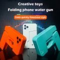 Creative Folding IPhone Toy Water Gun, Manual Shooting, Super Long Range, Decompression Funny, Three Color Matching, Safe And Water Gun Toys For Boys And Girls. 