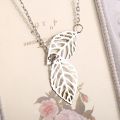 Creative Simple Double Gold Leaf Pendant Necklace Women's Trend Punk Tassel Chain Pendant Fashion Ladies Party Jewelry Gifts. 