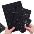 Black Pages Notebook Journal best for white pen and highlighter. 
