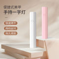 Handheld nail art lamp, small portable nail art light, ultraviolet quick-drying mini light therapy lamp, nail chip sticking diamond baking lamp. 