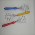 egg mixer- stainless steel egg mixer with plastic handle. 