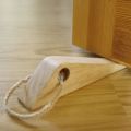Door Stopper in edge Shape made in Wood. 