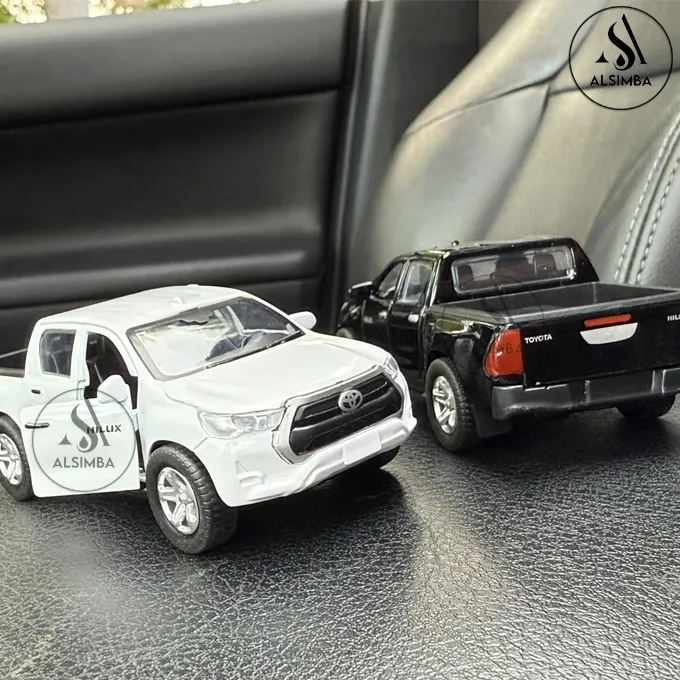 Toyota%20Hilux%20Vigo%20Die%20Cast%20Model%20Metal%20Toy%20Car%20%E2%80%93%20Lights%20&%20Music%20Sound%20Feature%20%E2%80%93%201:36%20Scale%20%E2%80%93%20Front%20Doors%20Openable%20%E2%80%93%20Size%20Approx.%205-Inches%20%E2%80%93%20White%20-%20Image%207
