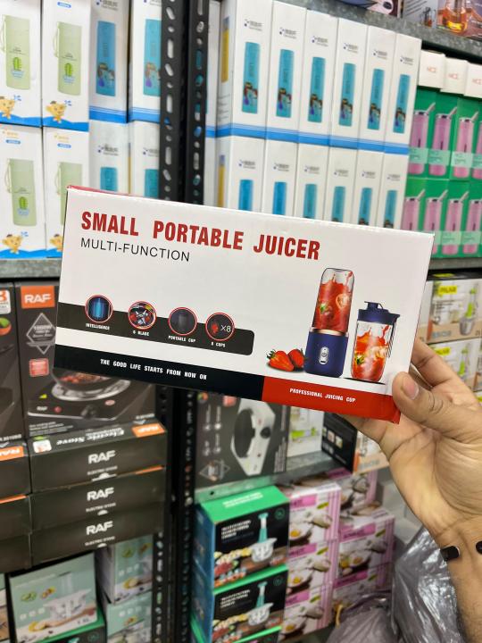 Multifunctional%20Portable%20Electric%20Juicer%20Blender%20(400%20ml%20Capacity)%20-%20Rechargeable%206-Blade%20Fresh%20Fruit%20Juicer%20&%20Smoothie%20Maker%20Bottle%20with%20Extra%20Travel%20Cup%20-%20Image%205