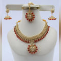 Golden Designer Jewellery Set with Red Stone. 