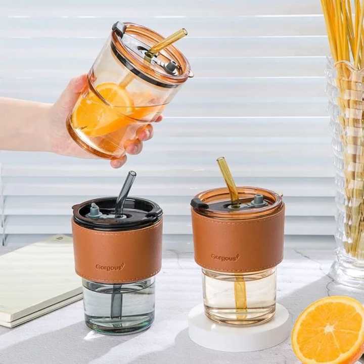 Tumbler%20Mug%20with%20Lid,%20Glass%20Straw%20and%20Protective%20Anti-Skid%20Leather%20Sleeve%20for%20Hot%20and%20Cold%20Beverages%20Tea%20Coffee%20Smoothies%20Fruit%20Juice%20Travel%20Mug%20.435ml%20-%20Image%208