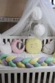 baby cot  3 feet braid one flat sheet pillow  3 cushions one canopy with pom pom and ring and 2 large clouds. 