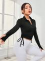 LONG SLEEVE SPORTS T-SHIRT WITH ZIPPER & DRAWSTRING FRONT. 