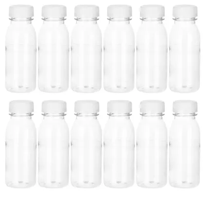 Pack%20of%2050%20Mini%20Empty%20Bottles%20for%20Zam%20Zam%20Water%20100ml%20BPA-Free%20Clear%20Plastic%20with%20Twist%20Caps%20Ideal%20for%20Hajj%20Umrah%20Gifts%20-%20Image%204