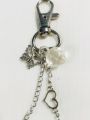 Cute, Unique, White Theme Elegant Keychains, Phone Charms, Bag Tussles | Fashion Hanging Jewelry of Chains, Charms, Beads | Random Style Jewelry | Fashion Accessories | Bag Tussles | Beautiful and Lightweight Jewelry | Trendy Looks. 
