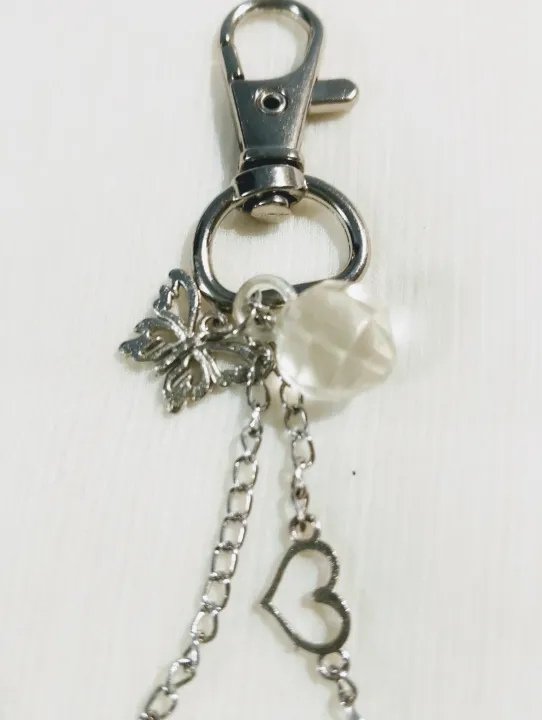 Cute,%20Unique,%20White%20Theme%20Elegant%20Keychains,%20Phone%20Charms,%20Bag%20Tussles%20%7C%20Fashion%20Hanging%20Jewelry%20of%20Chains,%20Charms,%20Beads%20%7C%20Random%20Style%20Jewelry%20%7C%20Fashion%20Accessories%20%7C%20Bag%20Tussles%20%7C%20Beautiful%20and%20Lightweight%20Jewelry%20%7C%20Trendy%20Looks%20-%20Image%203