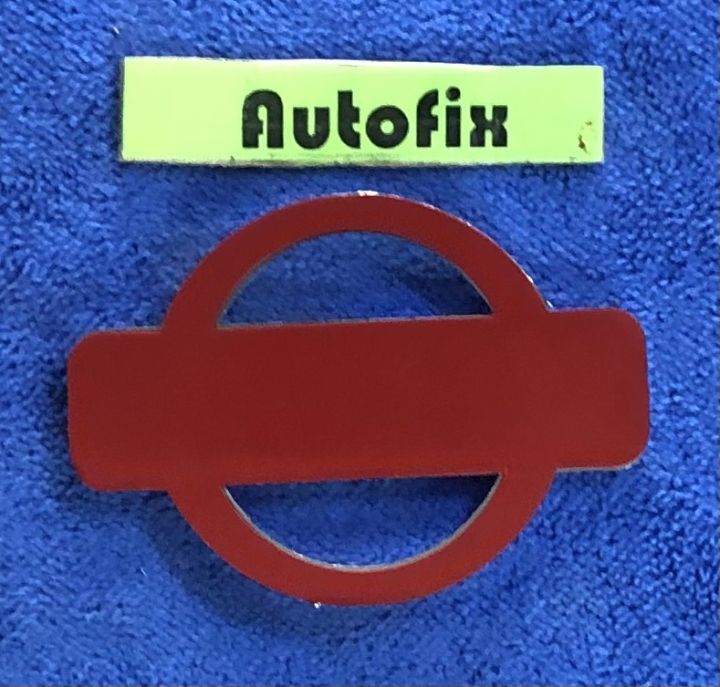 Nissan%20Plastic%20Stylish%20Logo%20Silver%2003%20Inches%2001%20Piece%20-%20Image%203