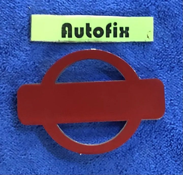 Nissan%20Plastic%20Stylish%20Logo%20Silver%2003%20Inches%2001%20Piece%20-%20Image%203