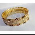 beautiful style churiyan (baangles) for girls perfect for formal wear and casual wear golden color size 2.4, 2.6 , 2.8 set of 6 bangles. 