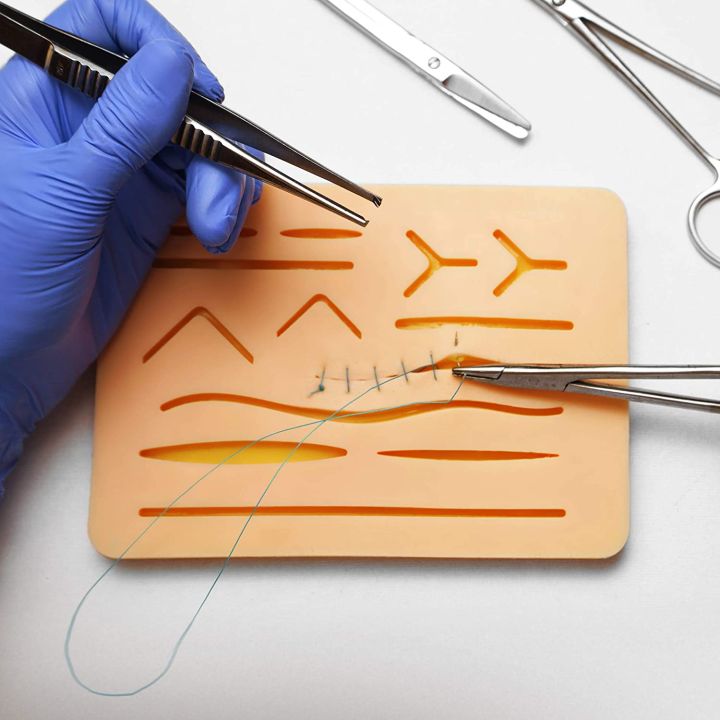 Stitching practice pad  Medical sutures Suture training  Suture Practice Kit - Medical Student Suturing Pad Does not Easily Break, Tear, or Rip - Pocket Size Training Pad with 11 Incisions & Wounds –"Training Tools for Med Students: The Best Suturing Pads