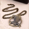 The Hunger Games Catching Fire Antique Bronze Necklace. 