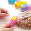 Portable Mini Heat Sealing Machine Impulse Sealer Seal Packing Plastic Bag for Food Storage. 