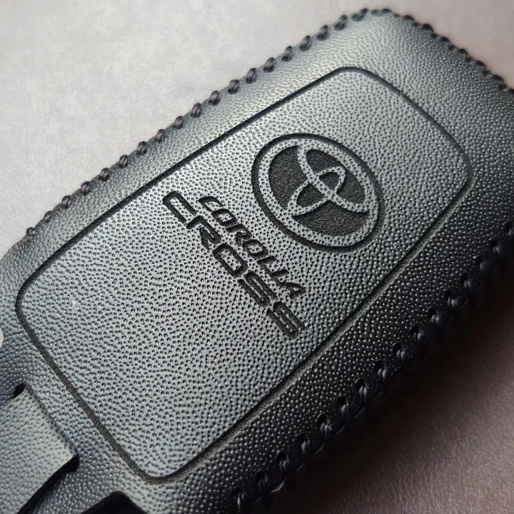 High%20Quality%20PU%20Leather%20Handmade%20Corolla%20Cross%20Key%20Cover%20-%20Premium%20Key%20Case%20Holder%20for%20Toyota%20Corolla%20Cross%20Key%20Remote,%20Keychain,%20Key%20Fob%20-%20Elegant%20Leather%20Key%20Protector%20for%20Corolla%20Cross%20Keys%20-%20Cross%20Keychain%20-%20Image%202