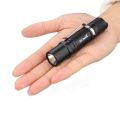 TG06S flashlight with battery and charging slot. 