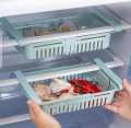NA Fridge organizer basket Stretchable "ElasticEase: The Singular Stretchable Fridge Basket". 