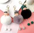 Cute Sleeping Baby Doll Pom Pom Keychain. 