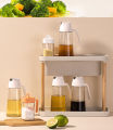 New 600ml Kitchen Storage Bottle with Automatic Opening and Closing of Glass Oiler Oil Bottle Seasoning Soy Sauce Vinegar Bottle Oil Dispenser Bottle for Kitchen, Automatic Flip Cap Cooking Oil Dispenser. 