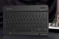 HB030B Universal Slim Portable Wireless Bluetooth 3.0 7-Colors Backlit Keyboard with Built in Rechargeable Battery, Black. 