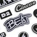 Computer embroidery superscript letters in black and white patches affixed to clothing accessories luggage accessories Aberdeen chapter embroidery fabric sticker badge. 