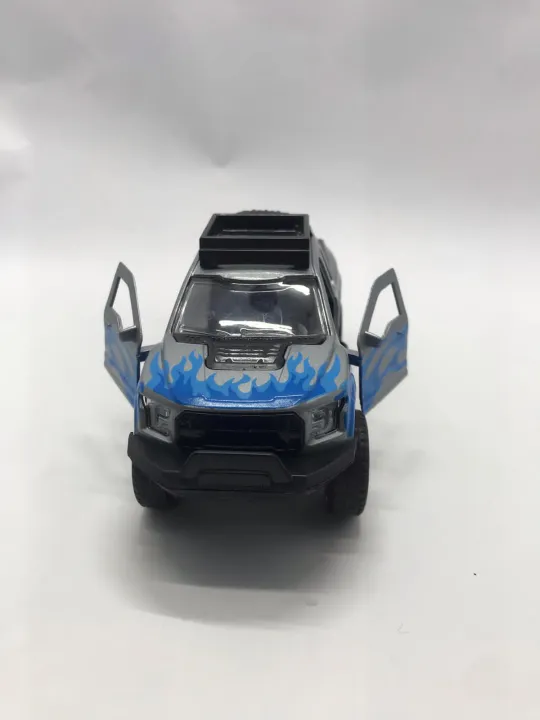 Hilux%20Dala%20Toy%20%E2%80%93%20Alloy%20Metal%20Pickup%20Truck,%20Pull%20Back%20Action,%20Realistic%20Interior,%20Openable%20Doors,%20Stylish%20Off-Road%20Model%20for%20Kids%20&%20Collectors%20%E2%80%93%20Durable%20&%20High-Quality%20Die-Cast%20Car%20-%20Image%205