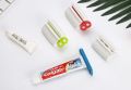 Rolling Tube Toothpaste Squeezer Dispenser Toothpaste Seat Holder Stand. 