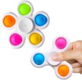 "Multicolor Pop It Fidget Spinner: Stress Relief Toy with Fun Popping Action". 