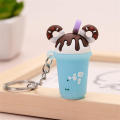 Soft and flexible Cartoon keychain Delightful Attractive packaging Compact size PVC soft rubber Vibrant colors Cute donut for. 