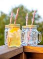 Mason Glass Jar With Straw Mocktail. 