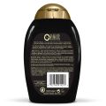 OGX Hydrate + Defrizz Kukui Oil Shampoo, 13 Ounce. 