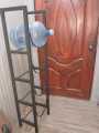 Water Bottle Storage Stand, 4-Tier Water Bottle Holder, 5 Gallons Heavy Duty Water Jug Rack for Kitchen Home and Office Easy To Assemble Black. 