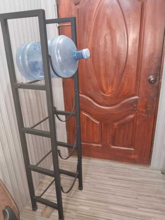 Water%20Bottle%20Storage%20Stand,%204-Tier%20Water%20Bottle%20Holder,%205%20Gallons%20Heavy%20Duty%20Water%20Jug%20Rack%20for%20Kitchen%20Home%20and%20Office%20Easy%20To%20Assemble%20Black%20-%20Image%206